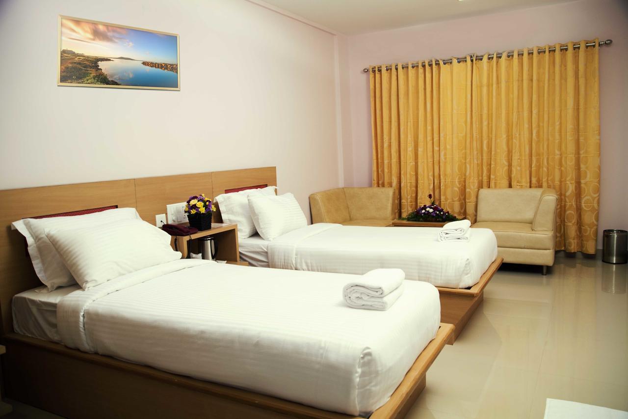 Hotel Rainbow Suites Kannur Esterno foto