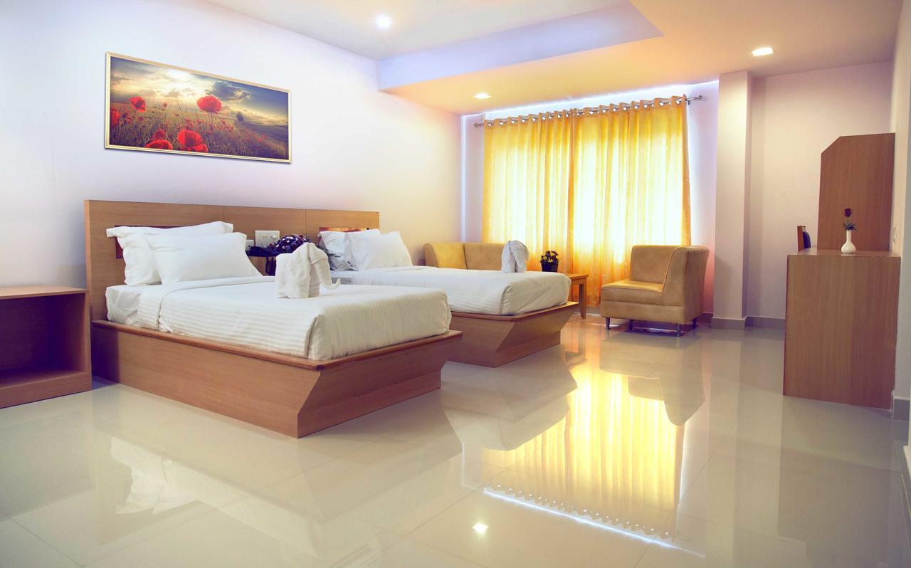 Hotel Rainbow Suites Kannur Esterno foto